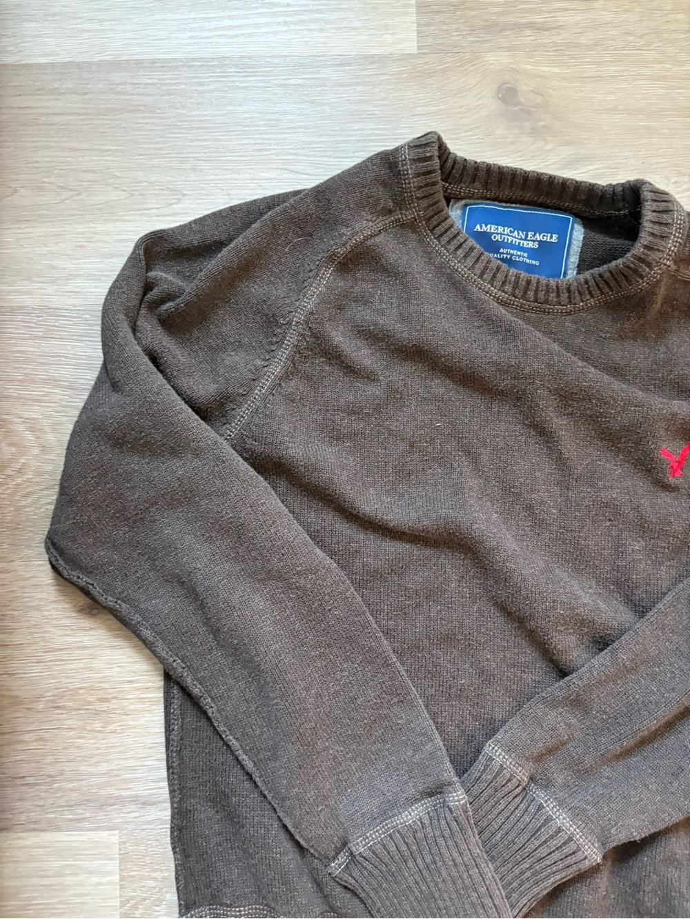 VintageAmerican Eagle Outfitters Men's Dark Brown Crewneck Sweater with Red Logo
